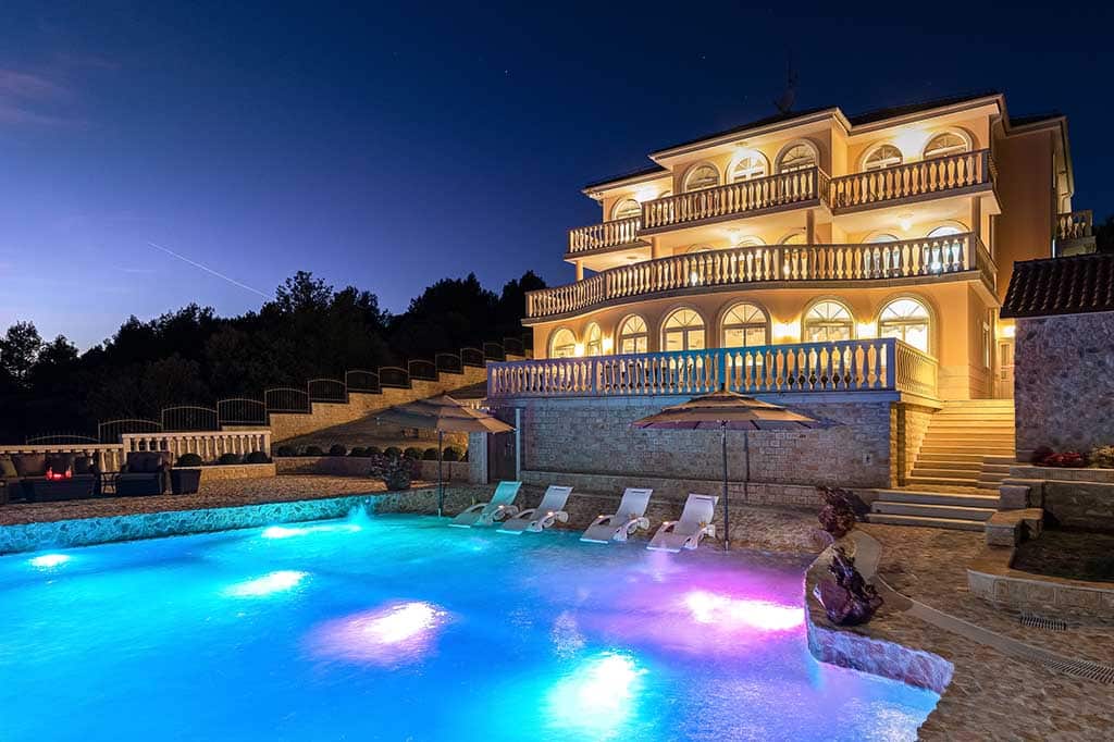 Luxury villa citrine pool at night
