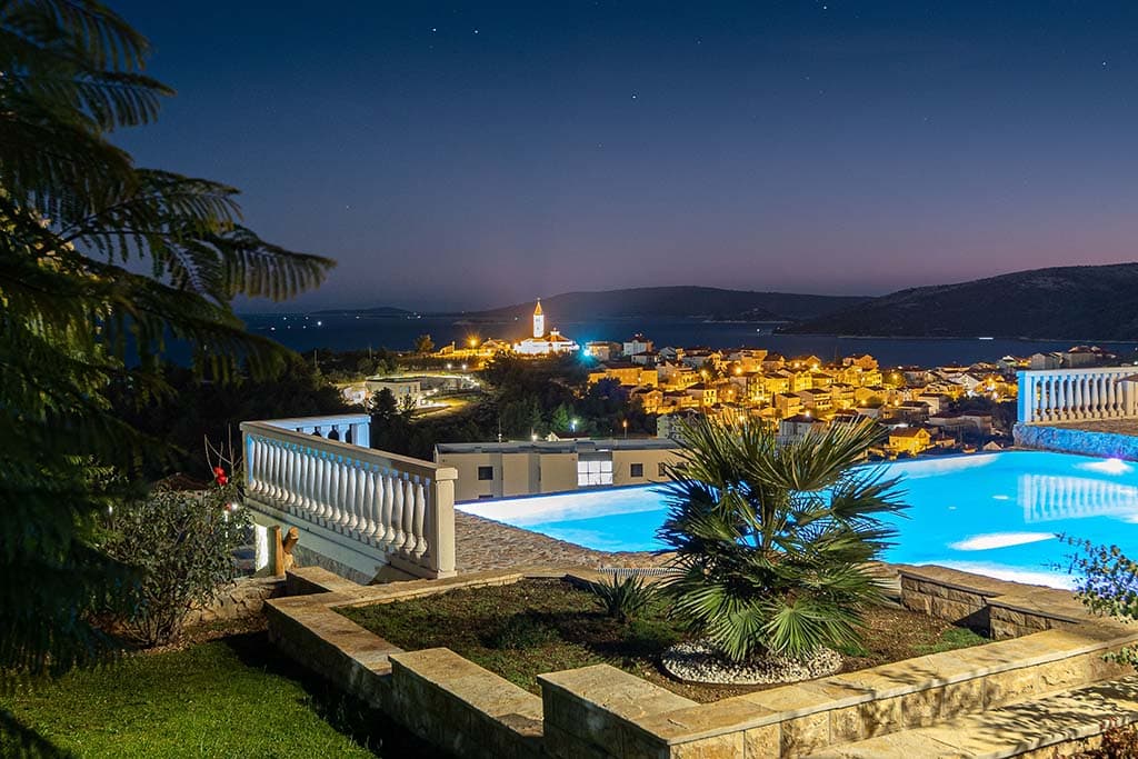 Luxury villa citrine pool at night