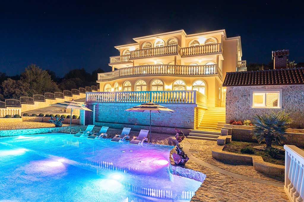 Luxury villa citrine pool at night
